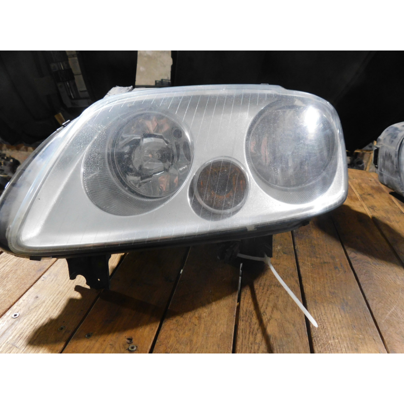 Фара ліва передня VW CADDY  2004-2009p 2K0941005B.